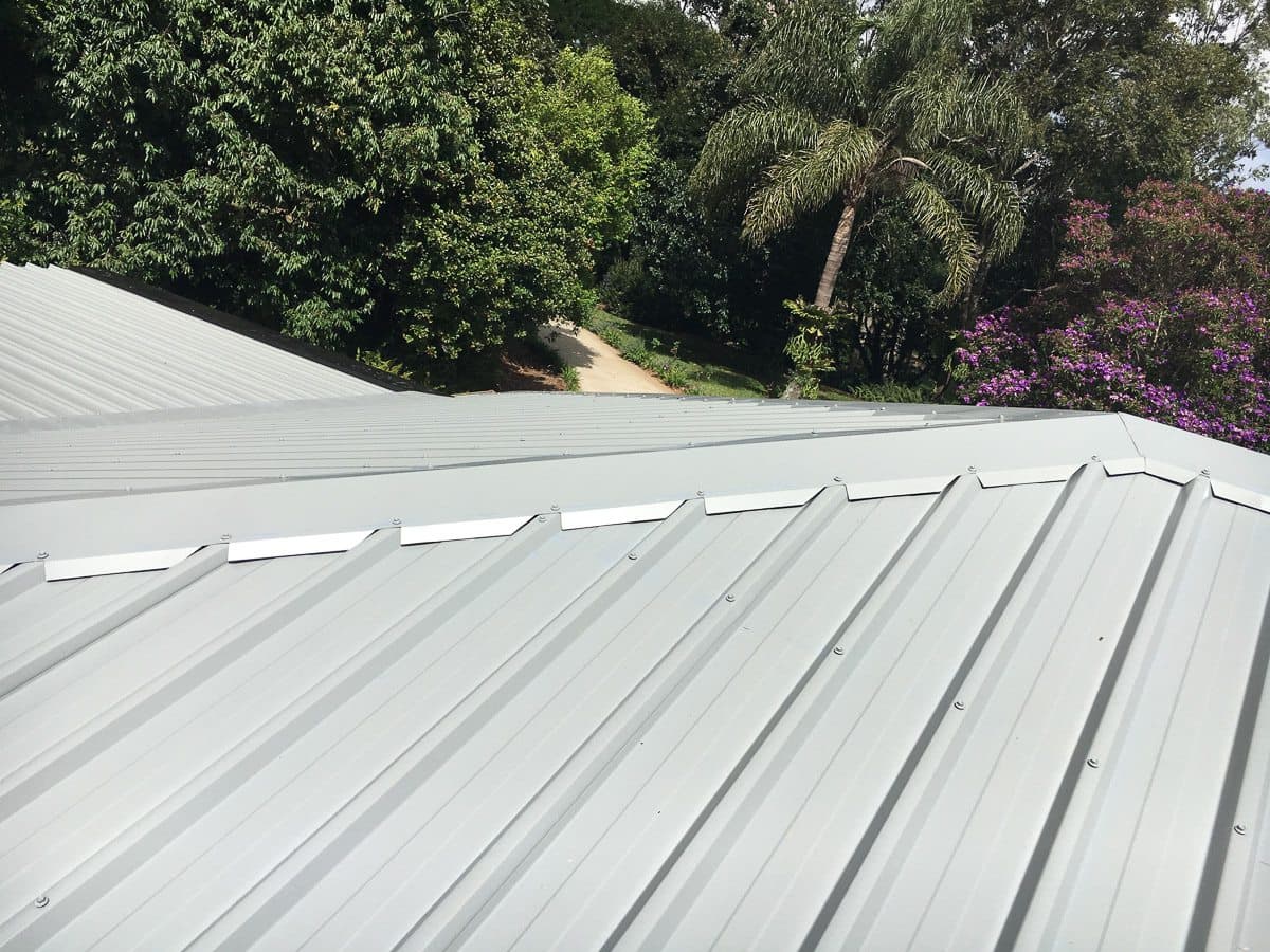 The Ridge of a New Roofing Project Near Completion
