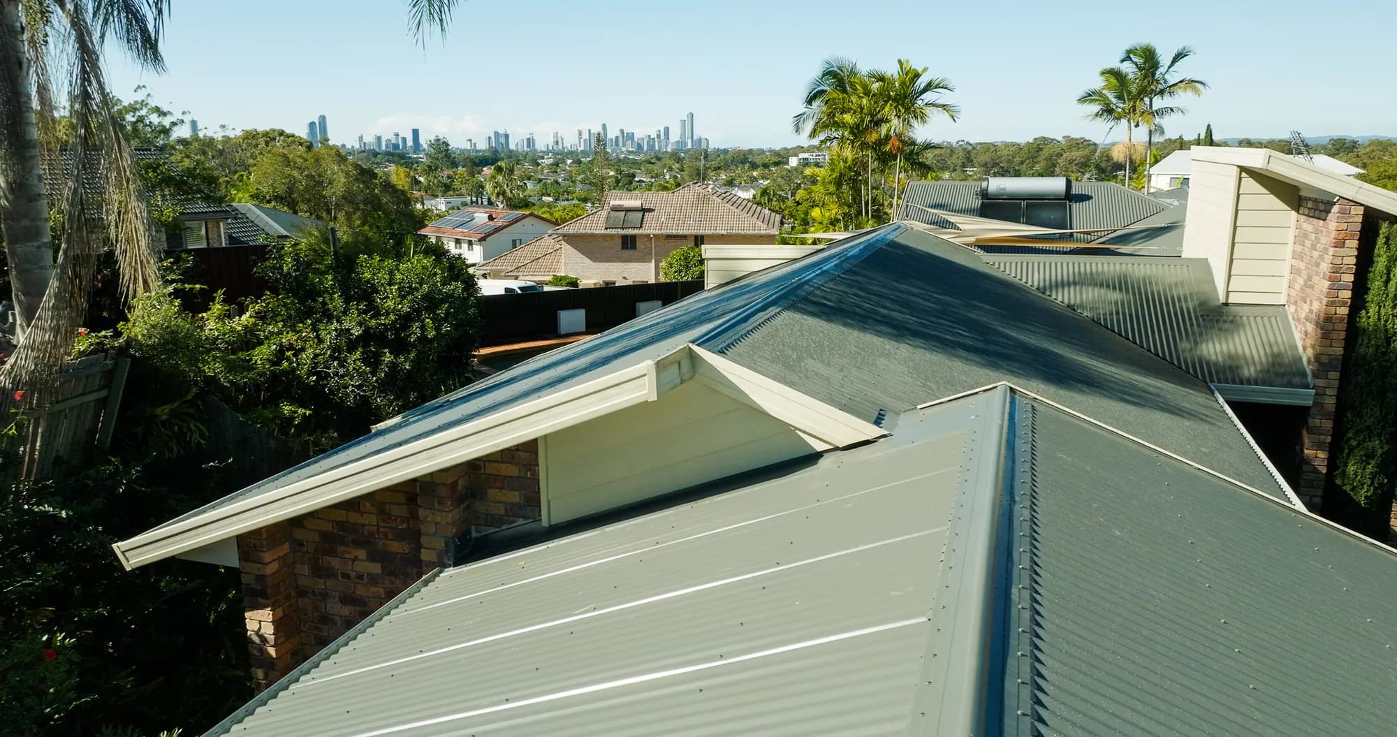 Aerial view of the new COLORBOND Custom Orb roof on the multi-level Benowa home
