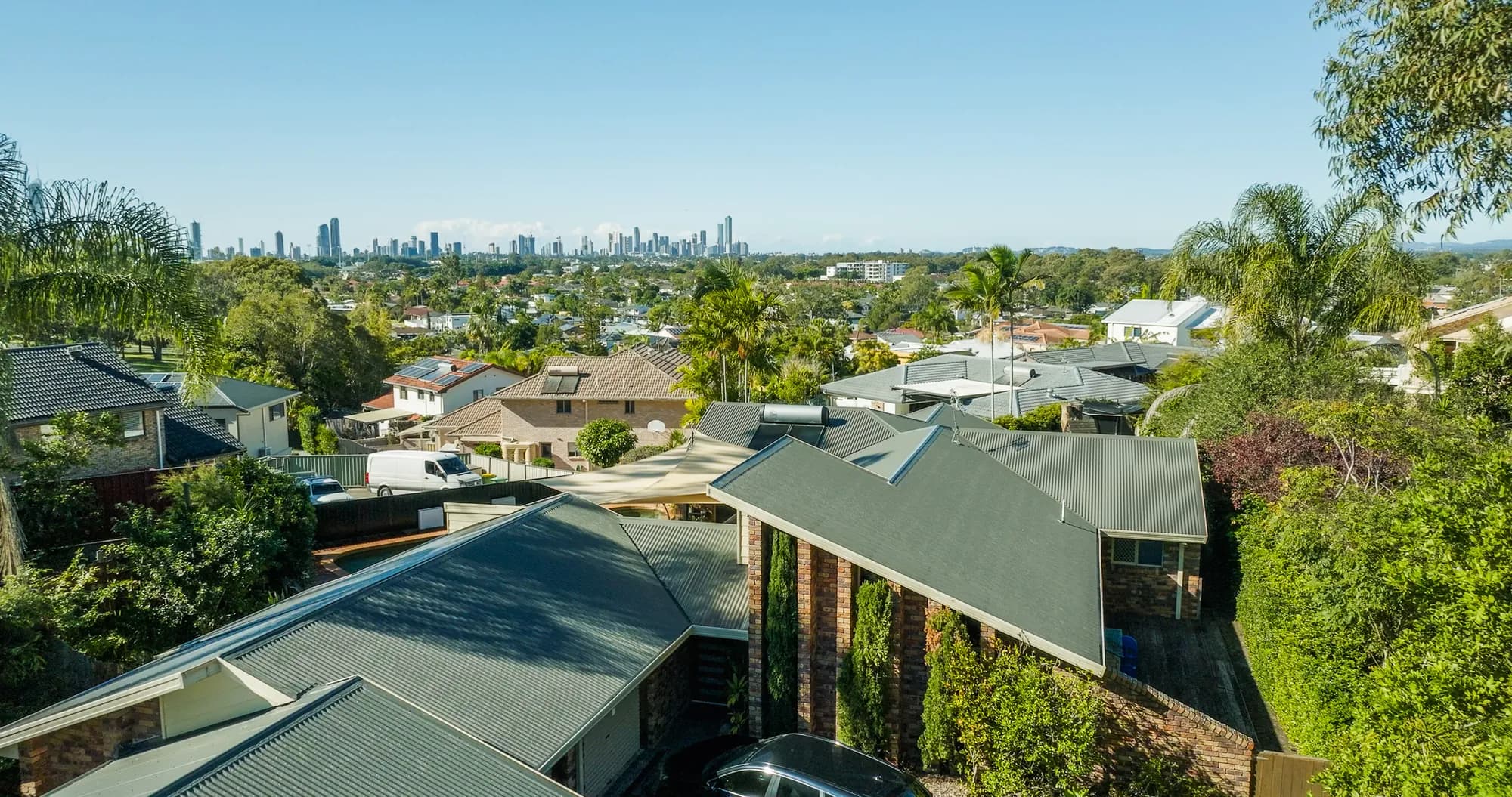 Aerial view of the new COLORBOND Custom Orb roof on the multi-level Benowa home