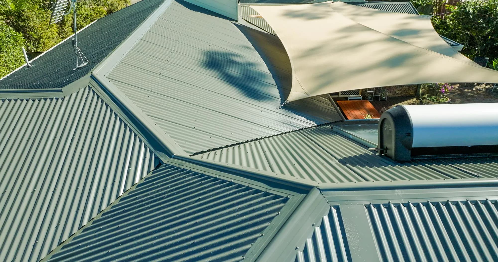 Aerial view of the new COLORBOND Custom Orb roof on the multi-level Benowa home