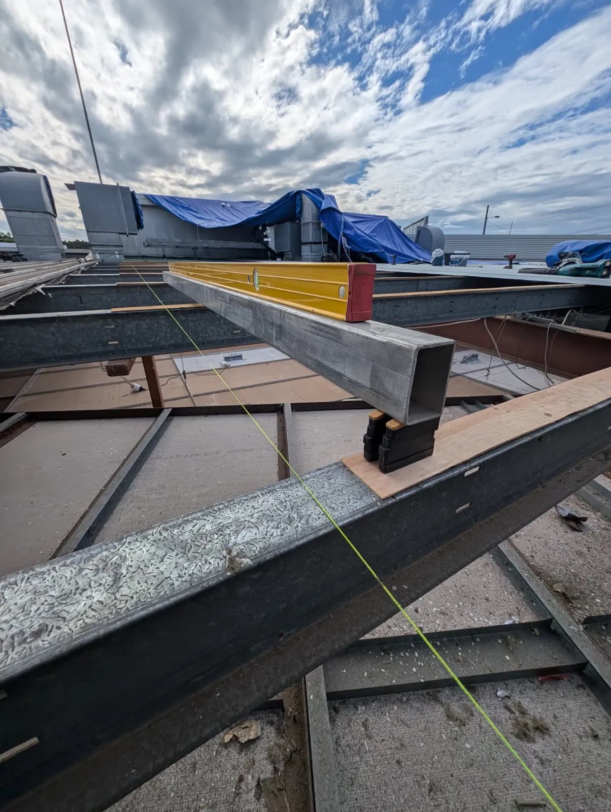 Timber diminishing furring set to achieve the roof fall at the Kippa-Ring car showroom