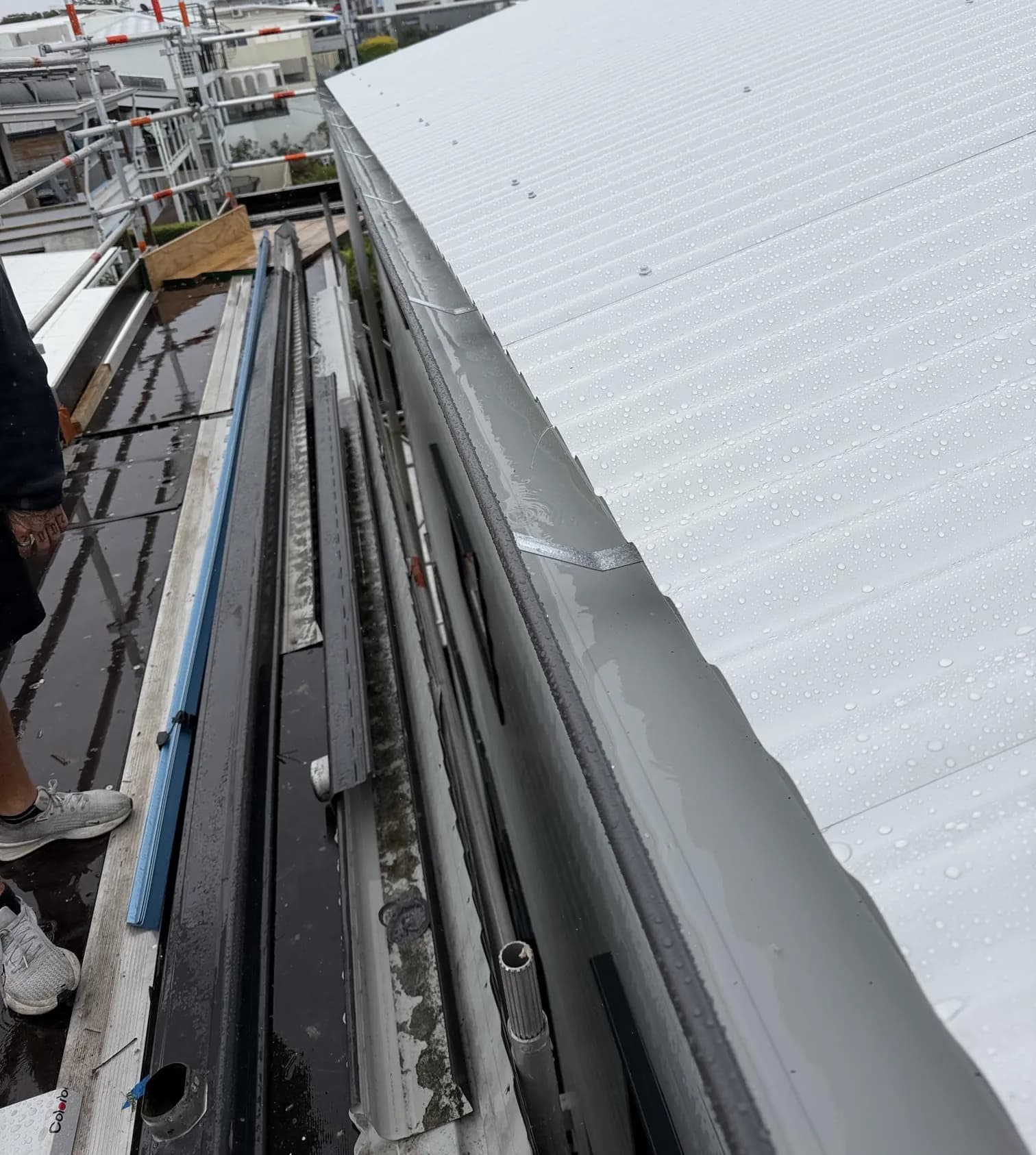 Roof replacement in progress at the Manly project
