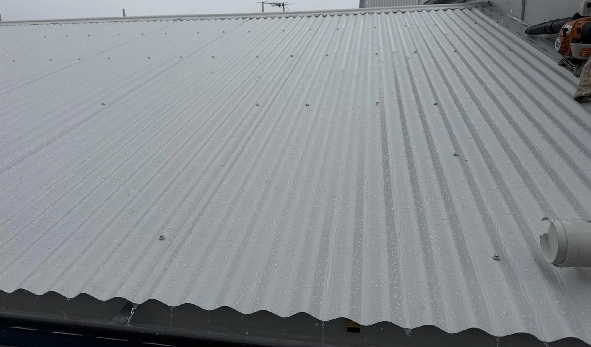 Roof replacement in progress at the Manly project