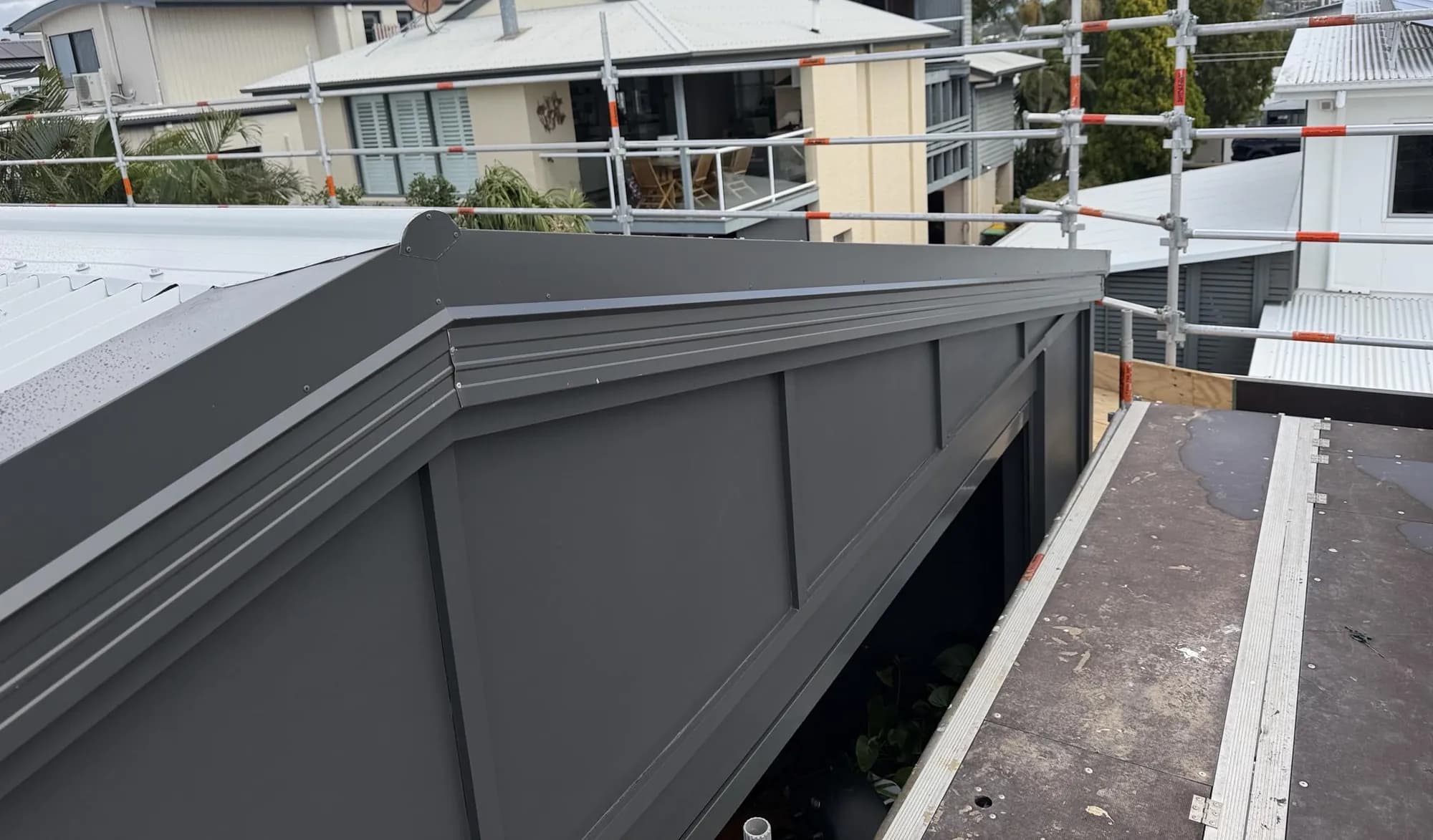 Roof replacement in progress at the Manly project
