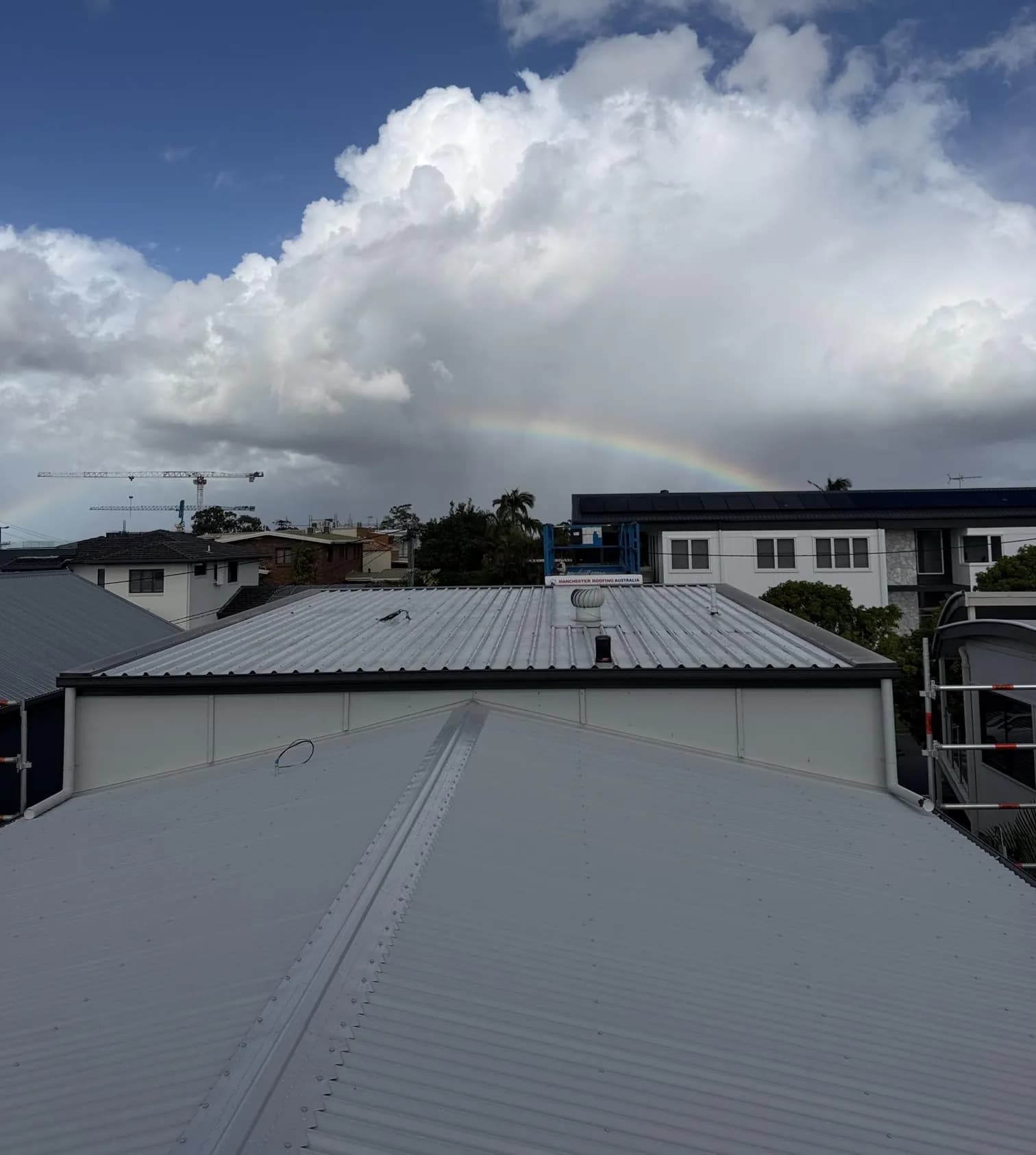 Roof replacement in progress at the Manly project
