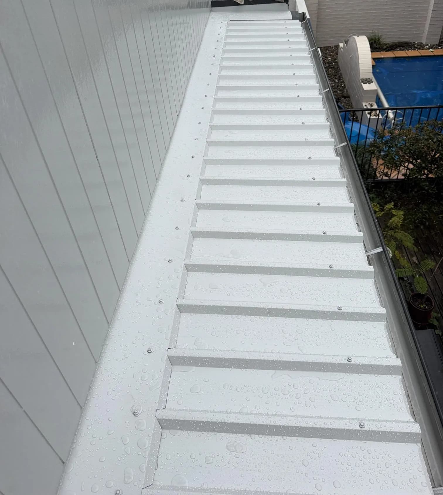 Roof replacement in progress at the Manly project