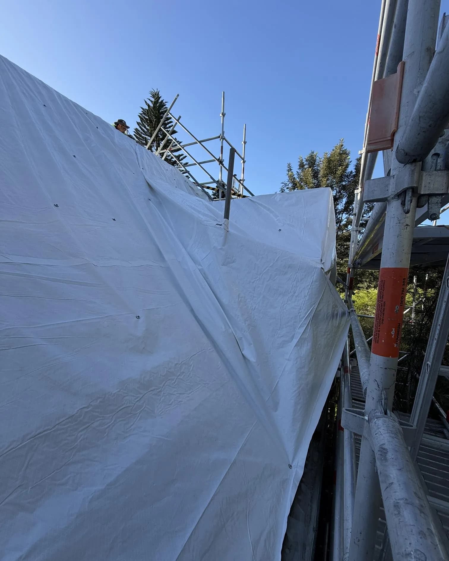 Decromastic tile and dormer roof replacement in progress at Waterford West