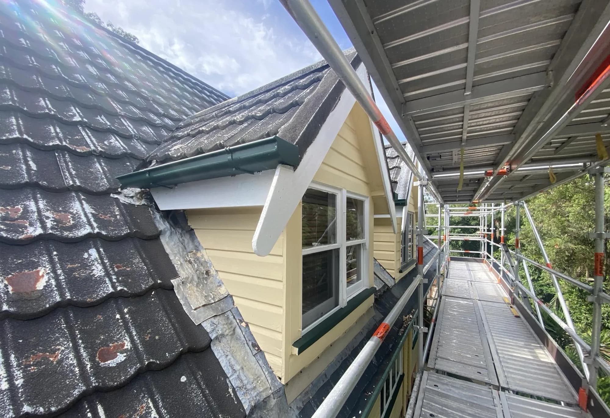 Decromastic tile and dormer roof replacement in progress at Waterford West
