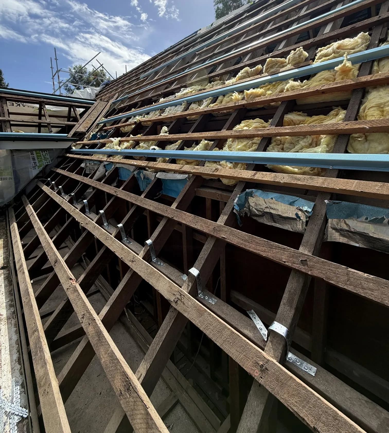 Decromastic tile and dormer roof replacement in progress at Waterford West