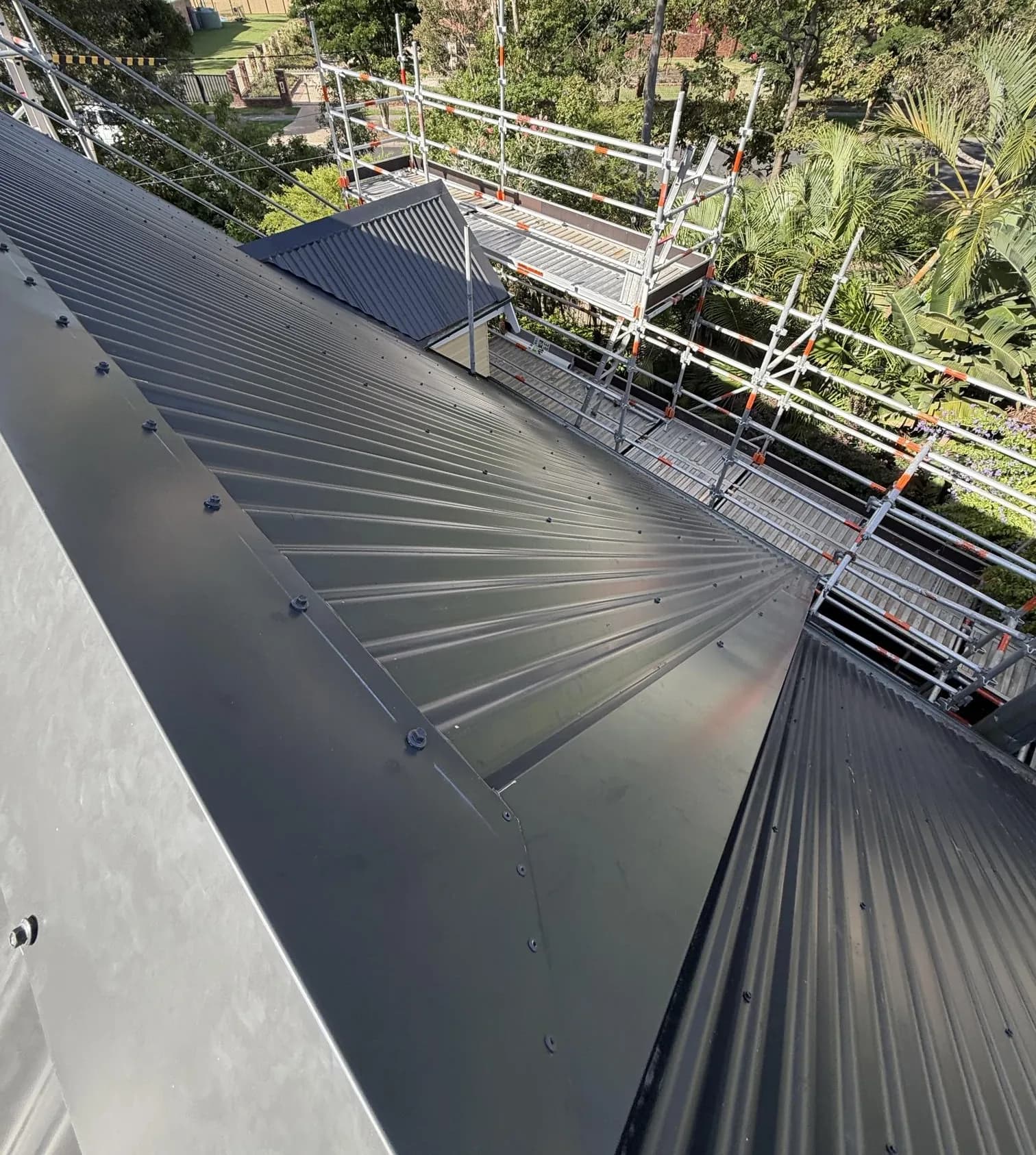 Decromastic tile and dormer roof replacement in progress at Waterford West