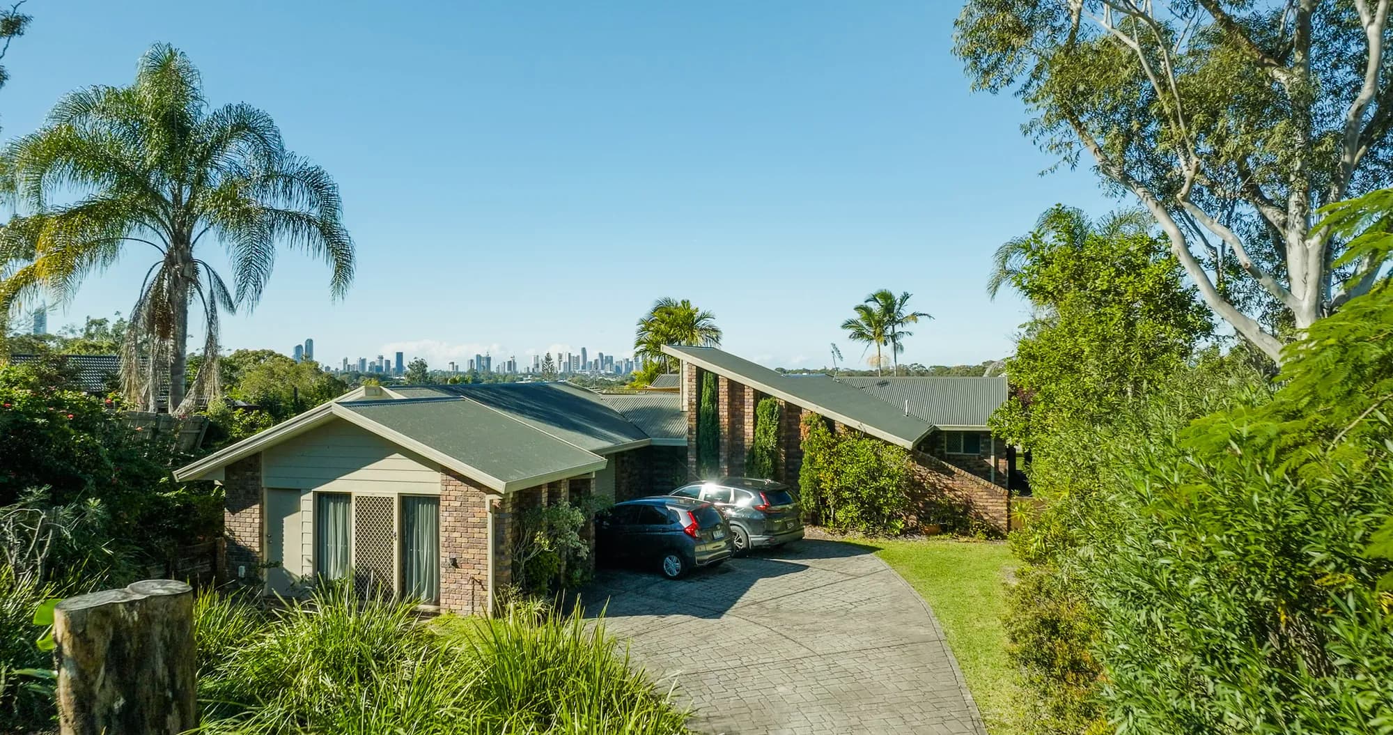Aerial view of the multi-level Benowa home with its new COLORBOND Custom Orb roof